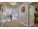 Upstairs hallway providing access to bedrooms, featuring carpet, and tasteful decor with a comforting ambiance at 139 Autumn Grove Ln, Mooresville, NC 28115