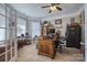 Spacious office with a large desk and bookshelf at 139 Autumn Grove Ln, Mooresville, NC 28115