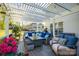 Cozy outdoor patio with comfortable seating under a pergola at 139 Autumn Grove Ln, Mooresville, NC 28115