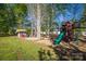 Expansive backyard with playground for outdoor fun at 139 Autumn Grove Ln, Mooresville, NC 28115