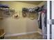 Well-organized walk-in closet with shelves, hanging rods, and ample space for clothing storage at 139 Autumn Grove Ln, Mooresville, NC 28115