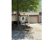 Charming townhome with a one-car garage and a welcoming front door adorned with a wreath at 14208 Castle Abbey Ln, Charlotte, NC 28277