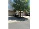 Exterior view of townhomes with garages and well-maintained landscaping at 14208 Castle Abbey Ln, Charlotte, NC 28277