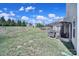 Expansive backyard with a pergola-covered patio, ideal for outdoor dining and relaxation at 1717 Mill Creek Sw Ln, Concord, NC 28025
