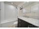 Updated bathroom with a shower over tub and a marble vanity, creating an elegant feel at 1717 Mill Creek Sw Ln, Concord, NC 28025