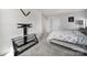 Comfortable bedroom featuring a ceiling fan, natural light, and neutral decor at 1717 Mill Creek Sw Ln, Concord, NC 28025