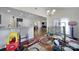 Open design bonus room with a kitchen bar and an eat in nook for entertaining and convenience at 1717 Mill Creek Sw Ln, Concord, NC 28025