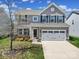 Charming two-story home with landscaped yard and two car garage at 1717 Mill Creek Sw Ln, Concord, NC 28025