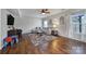 Spacious living room with hardwood floors and a ceiling fan at 1717 Mill Creek Sw Ln, Concord, NC 28025