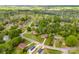 A charming neighborhood viewed from above, showcasing winding streets and tree-lined properties at 2043 Greenoak Dr, Shelby, NC 28152
