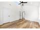 This bedroom has high ceilings, a ceiling fan, wood laminate flooring and two closets at 2043 Greenoak Dr, Shelby, NC 28152