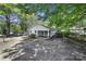 Well-maintained single-story home featuring a screened-in porch and covered parking area at 216 W 16Th St, Kannapolis, NC 28081