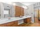 Bathroom vanity with double sinks, wood cabinetry, and a large mirror at 2234 Hamilton Mill Rd, Charlotte, NC 28270