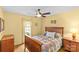 Bedroom with hardwood floors, ceiling fan, and natural light at 2234 Hamilton Mill Rd, Charlotte, NC 28270