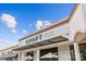 Commercial building facade with CHOPT signage, awnings, and architectural details against a blue sky backdrop at 2234 Hamilton Mill Rd, Charlotte, NC 28270