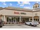 ROZ Grill restaurant facade featuring clear signage, ample windows, and convenient customer parking at 2234 Hamilton Mill Rd, Charlotte, NC 28270