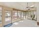 Sunroom with lots of light and views of the surrounding landscape at 2234 Hamilton Mill Rd, Charlotte, NC 28270
