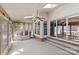 Sunroom featuring multiple windows and a ceiling fan at 2234 Hamilton Mill Rd, Charlotte, NC 28270