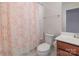 Bathroom featuring shower with curtain, toilet, sink and vanity cabinet at 226 Scenic View Ln, Matthews, NC 28104