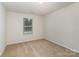 Cozy bedroom with window at 226 Scenic View Ln, Matthews, NC 28104