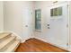 Welcoming foyer with hardwood floors, staircase, and a bright, airy feel, leading to various rooms at 226 Scenic View Ln, Matthews, NC 28104