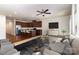 Open living room and kitchen area featuring hardwood floors, stainless steel appliances, and modern decor at 226 Scenic View Ln, Matthews, NC 28104