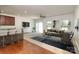 Bright living room boasts natural light, neutral tones, stylish furnishings, and an open floor plan at 226 Scenic View Ln, Matthews, NC 28104