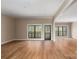 Expansive living room featuring hardwood floors, natural light, and an open layout ideal for entertaining at 2596 Polo Ln, Maiden, NC 28650