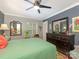 Bright bedroom with a queen bed, dresser, and large mirror creating an open feel at 2620 Park Rd, Charlotte, NC 28209