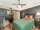 Spacious bedroom with a queen bed, decorative wall art, and ample natural light at 2620 Park Rd, Charlotte, NC 28209