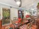 Bright dining area featuring a sliding glass door to the outside, and ceiling fan creating a comfortable and inviting space at 2620 Park Rd, Charlotte, NC 28209