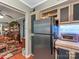 Kitchen featuring stainless steel refrigerator and appliances, ample cabinet space, and functional layout provides efficient meal preparation at 2620 Park Rd, Charlotte, NC 28209