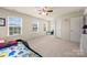 Bright and spacious bedroom with ample natural light and neutral carpeting throughout at 269 Keating Place Dr, Fort Mill, SC 29708
