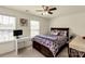 Bedroom with a large window, ceiling fan, and comfortable furniture at 269 Keating Place Dr, Fort Mill, SC 29708