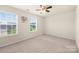 Neutral bedroom with a ceiling fan and two windows providing lots of natural light at 269 Keating Place Dr, Fort Mill, SC 29708