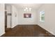 Cozy dining area with hardwood floors, decorative lighting, and large windows at 269 Keating Place Dr, Fort Mill, SC 29708