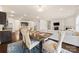 Dining room that connects the living area and the modern kitchen at 269 Keating Place Dr, Fort Mill, SC 29708