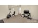 Carpeted upper hallway with access to laundry area and bedroom, creating a seamless, functional space at 269 Keating Place Dr, Fort Mill, SC 29708