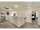 Upstairs hallway with modern lighting, views to rooms, and easy access to the laundry room at 269 Keating Place Dr, Fort Mill, SC 29708