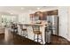 Kitchen bar seating and stainless steel appliances, ideal for casual dining at 269 Keating Place Dr, Fort Mill, SC 29708
