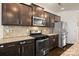 Kitchen with stainless steel appliances, granite countertops, and plenty of cabinet space at 269 Keating Place Dr, Fort Mill, SC 29708