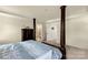 A view of the main bedroom, showing an entrance to the bathroom, with neutral carpeted floors at 269 Keating Place Dr, Fort Mill, SC 29708