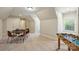 Spacious bonus room with foosball table and game table with seating at 272 Harbor Ridge Dr, Statesville, NC 28677