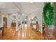 Inviting foyer with hardwood floors, crown molding, and a glimpse into the spacious living room at 272 Harbor Ridge Dr, Statesville, NC 28677