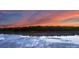 Stunning waterfront view of the lake at sunset, reflected in the calm water at 272 Harbor Ridge Dr, Statesville, NC 28677
