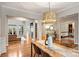 Open living room boasts hardwood floors, fireplace, and plenty of natural light at 272 Harbor Ridge Dr, Statesville, NC 28677