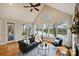 Bright living room with fireplace, hardwood flooring and a lake view at 272 Harbor Ridge Dr, Statesville, NC 28677