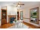 Charming office with a fireplace, built-in shelves, and bright windows overlooking the outdoor greenery at 272 Harbor Ridge Dr, Statesville, NC 28677