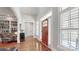 Bright foyer with hardwood floors, high ceilings, and elegant architectural details at 305 Caledonia Way, Waxhaw, NC 28173