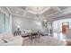 Elegant living room with coffered ceilings, hardwood floors, and an open layout at 305 Caledonia Way, Waxhaw, NC 28173